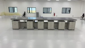 MUSK Scientific mobile island lab bench with under-bench cabinets installed at NADEC laboratory